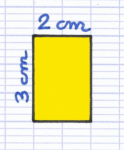 Le premier rectangle du patron du pavé droit est tracé en jaune.